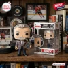 Barry Melrose ESPN Vinyl Figure standing beside its branded display box holding a play board on a wooden shelf.