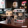 Barry Melrose ESPN Vinyl Figure wearing a plaid jacket and headset, standing next to its branded display box on a desk.