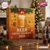 Front view of a Beer Advent Calendar 2026 box with a large beer mug illustration on a wooden table.
