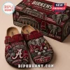 Birkenstock Alabama Crimson Tide Suede Clogs with team mascot, logo, and Bryant-Denny Stadium graphics in maroon.