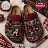Birkenstock Alabama Crimson Tide Suede Clogs with team mascot, football imagery, and stadium graphics on a crimson base.