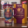 Front view of Brisbane Lions 2024-2026 YETI Stanley Tumbler with matching gift box on wooden table.