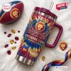 Front view of Brisbane Lions 2024-2026 YETI Stanley Tumbler with maroon handle and straw lid.