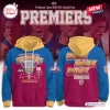 Front and back view of Brisbane Lions AFL 2026 Grand Final Premiers Hoodie with gold hood and blue and red body graphics.