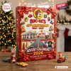 Front view of the Buc-ee's 45th Anniversary Advent Calendar 2026 box with a road graphic and red bows on a wooden table.