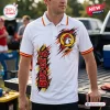 Front view of a white polo shirt with a graphic mascot print, red and yellow collar accents, and Buc-ee's branding.