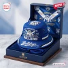 Front view of a blue Canterbury-Bankstown Bulldogs 91st Anniversary bucket hat inside a matching display box.