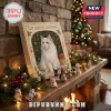 Cat Christmas Advent Calendar 2026 featuring a white cat print, displayed on a fireplace mantle with small cat figurines.