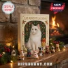 Cat Christmas Advent Calendar 2026 featuring a white cat image and miniature feline ornaments on a rustic fireplace mantle.