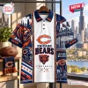 Front view of a Chicago Bears NFL Polo Shirt featuring a skyline graphic, a roaring bear, and football motifs.
