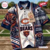 Front view of Chicago Bears NFL polo shirt featuring a bear graphic, skyline print, and football imagery.