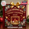 Classic Broadway Shows 2026 Advent Calendar in dark red featuring gold theater masks, a stage, and holiday pine decorations.