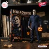 Classic Horror Movie Halloween Collectible Action Figure with white mask, dark blue jumpsuit, knife, and jack-o'-lantern.