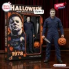 Classic Horror Movie Halloween Collectible Action Figure of Michael Myers with a knife and pumpkin accessory in packaging.