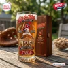 Front view of Cleveland Indians Chief Wahoo 125th Anniversary beer glass with wooden gift box on a wooden table.