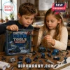 Construction Crew Tools 2026 Ornament Advent Calendar with children unboxing miniature tool decorations on a workshop table.