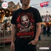 Front view of a black t-shirt featuring a creepy clown graphic with red text stating Sweet Nightmares.