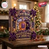Front view of a purple Crown Royal 87th Anniversary Advent Calendar box on a wooden table with mini bottles.