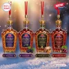 Front view of four Crown Royal 87th Anniversary Advent Calendar bottles with distinct labels and red hanging cords.