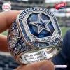 Closeup of a Dallas Cowboys 66th Anniversary Silver Commemorative Ring featuring a large blue star and mascot design.