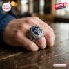 Close-up of a hand wearing a Dallas Cowboys 66th Anniversary Silver Commemorative Ring with a blue center star.