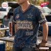 Front view of a distressed blue V-neck T-shirt with Cowboys 1960 text and a star emblem.