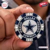 Dallas Cowboys NFL Poker Set chip featuring a blue and silver star emblem with laurel leaves held between thumb and finger.