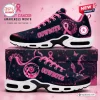 Side view of Dallas Cowboys x Breast Cancer Awareness Air Max Plus Sneakers with pink ribbons.