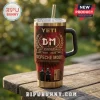 Depeche Mode 46th Anniversary YETI Stanley tumbler in red and black with band member imagery and text on a wooden table.