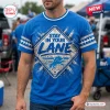Front view of a man wearing a blue T-shirt featuring a diamond-shaped graphic with the text Stay In Your Lane.