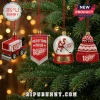 Detroit Red Wings 100th Anniversary 2026 Advent Calendar ornaments featuring a zamboni, pennant, snow globe, and knit hat.