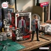 Dirty Harry 55th Anniversary Harry Callahan Hot Toys figure wearing a grey blazer, red sweater, and holding a magnum pistol.