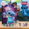 Disney Lilo and Stitch 2026 Advent Calendar featuring 24 numbered panels, galaxy background, and small Stitch character toys.
