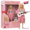 Front view of Dolly Parton memorial limited edition collector doll in pink dress holding guitar.