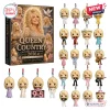 Dolly Parton Queen of Country 2026 Advent Calendar box with illustrated imagery and 24 diverse miniature doll ornaments.