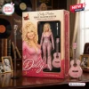 Front view of the Dolly Parton Tribute Collector's Edition Doll in its pink packaging box with accessories.