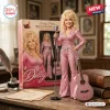 Front view of the Dolly Parton Tribute Collector's Edition Doll standing next to its pink packaging box.