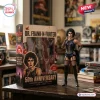 Dr. Frank-N-Furter 50th Anniversary Hot Toys action figure standing beside its branded commemorative packaging.