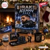 Front view of the Drake Iceman 2026 Advent Calendar box surrounded by themed merchandise on a wooden surface.
