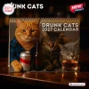 Front view of Drunk Cats 2027 Calendar featuring cats with drinks on a wooden table.