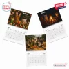 Top view of three open pages from the Drunk Cats 2027 Calendar displaying April, May, and June monthly grids.