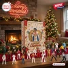Front view of an Elvis Presley 2026 Advent Calendar surrounded by miniature figurines on a mantelpiece.