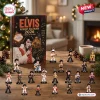 Front view of Elvis Presley 2026 Christmas Advent Calendar box with miniature figurines arranged on a wooden table.