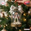 Elvis Presley King Of Rock n Roll Christmas ornament featuring a figurine in a glass dome with a white music note ribbon.