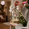 Elvis Presley King Of Rock n Roll Christmas ornament featuring an Aloha from Hawaii figurine inside a glass dome with bow.