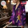 Elvis Presley TCB Galaxy Purple Cardigan featuring a gold silhouette, butterfly patterns, and TCB lightning bolt logo.