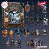 Front view of a Fourth Wing 2026 Advent Calendar box surrounded by dragon and character themed ornaments.