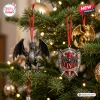 Front view of dragon and shield ornaments hanging on a Christmas tree for the Fourth Wing 2026 Advent Calendar.