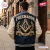 Back view of a person wearing a navy and white Freemason Premium Varsity Baseball Jacket with embroidered emblems.