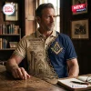 Man wearing a two-tone Freemasonry Brotherhood Premium Polo Shirt with gold chain and architectural graphics.